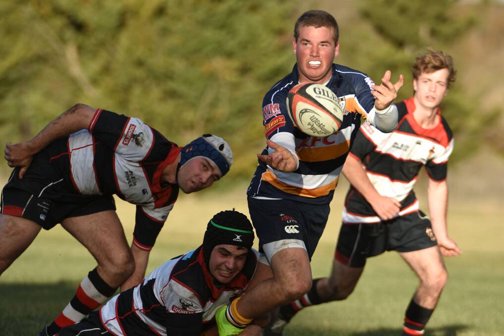 Josh Croft sparks another attack for Armidale against Barbarians on Saturday. 
Photo: www.pixonline.com.au