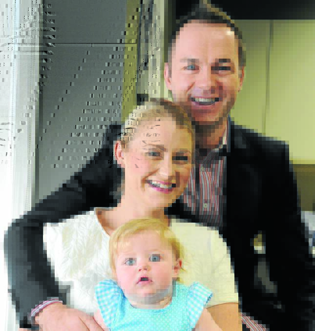 NEW HOME: Emergency doctor Michael Livingston with his wife Rachel and their daughter Lillybelle. Photo: Namoi Valley Independent