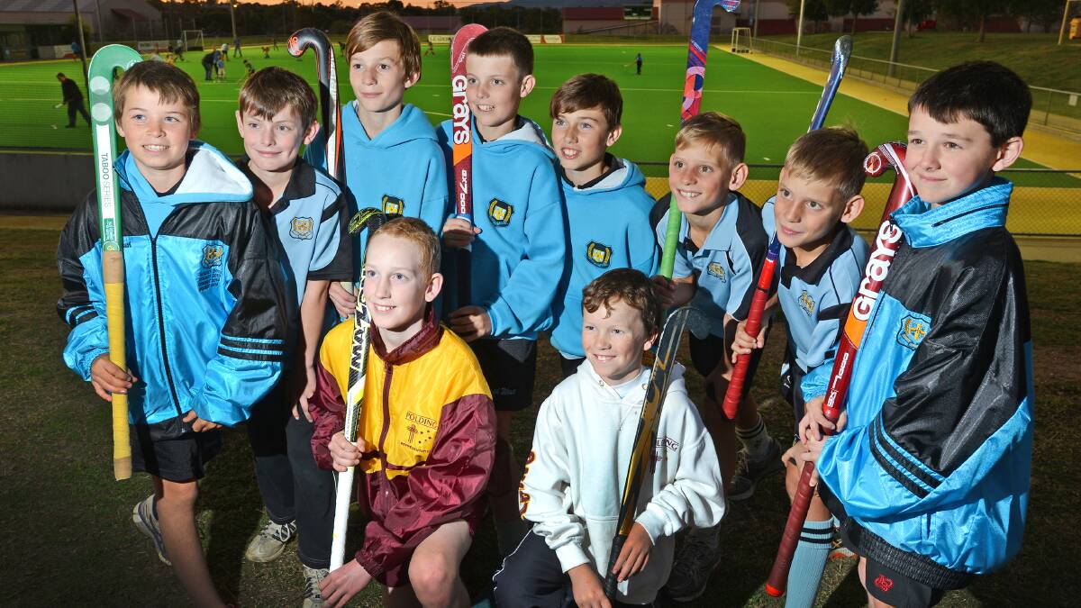 Representing Polding  at the State Hockey Championships in Canberra next week are (front from left)  Noah Pitt and Luke Maher while (back from left, standing)  Toby Smith, Oliver McGill, Cameron Barber, Ryan Constable, George Nash, Ryan 
Taggart, Chris Taggart and Lachlan Butler will represent North West. Photo: Barry Smith 180614BSD02