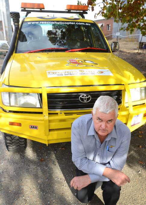 STOLEN: Driving lights were among the items stolen from the Westpac Rescue Helicopter Service's 4WD. Pictured is events co-ordinator Jeff Galbraith who said much of the equipment and the vehicle's maintenance were donated by the community and local businesses. Photo: Barry Smith  190514BSE04