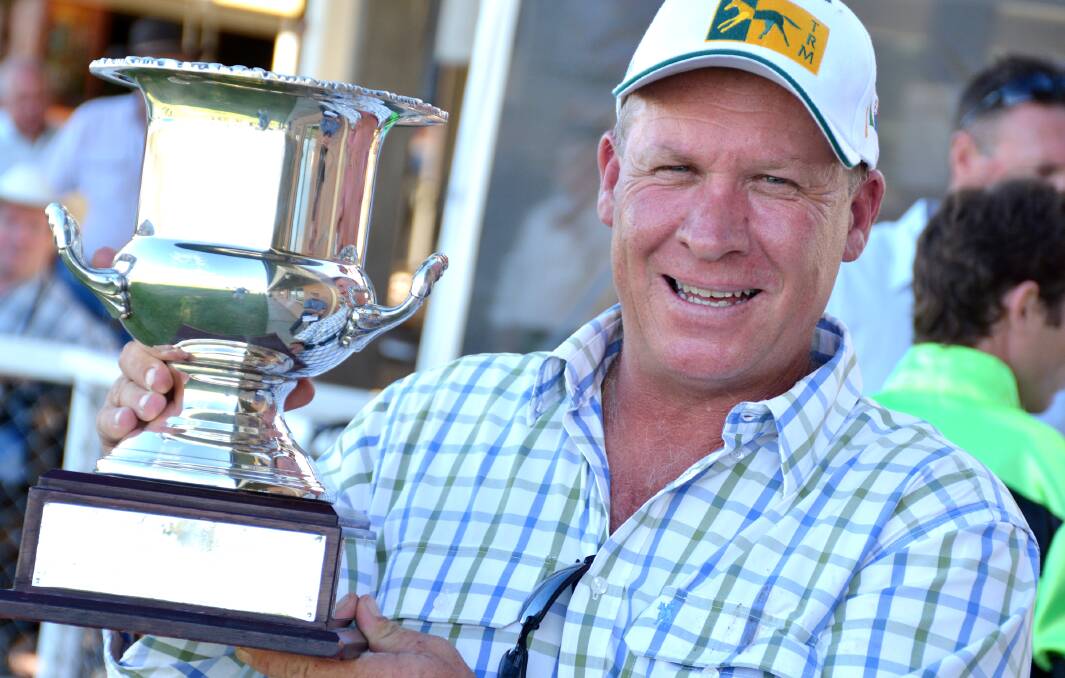 Craig Martin and his first Quirindi Cup yesterday. Photo: Barry Smith 210214 BSE33