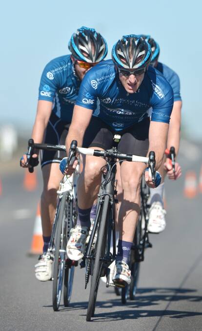 Darren Traill leads some of his team Baiocchi Griffin JT  Fossey teammates in a local criterium race last month. On Sunday he’ll be trying to win back to back Yarrowyck road races. Photo: Barry Smith 060414BSA12