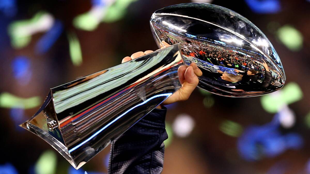 For many Australian fans the most exciting part of Monday's 2015 Super Bowl game between the Seattle Seahawks and the New England Patriots will be the half-time commercials which retail for $4.5 million per 30 seconds. Pictured is the Vince Lombardi Trophy. Photo: Getty Images. 