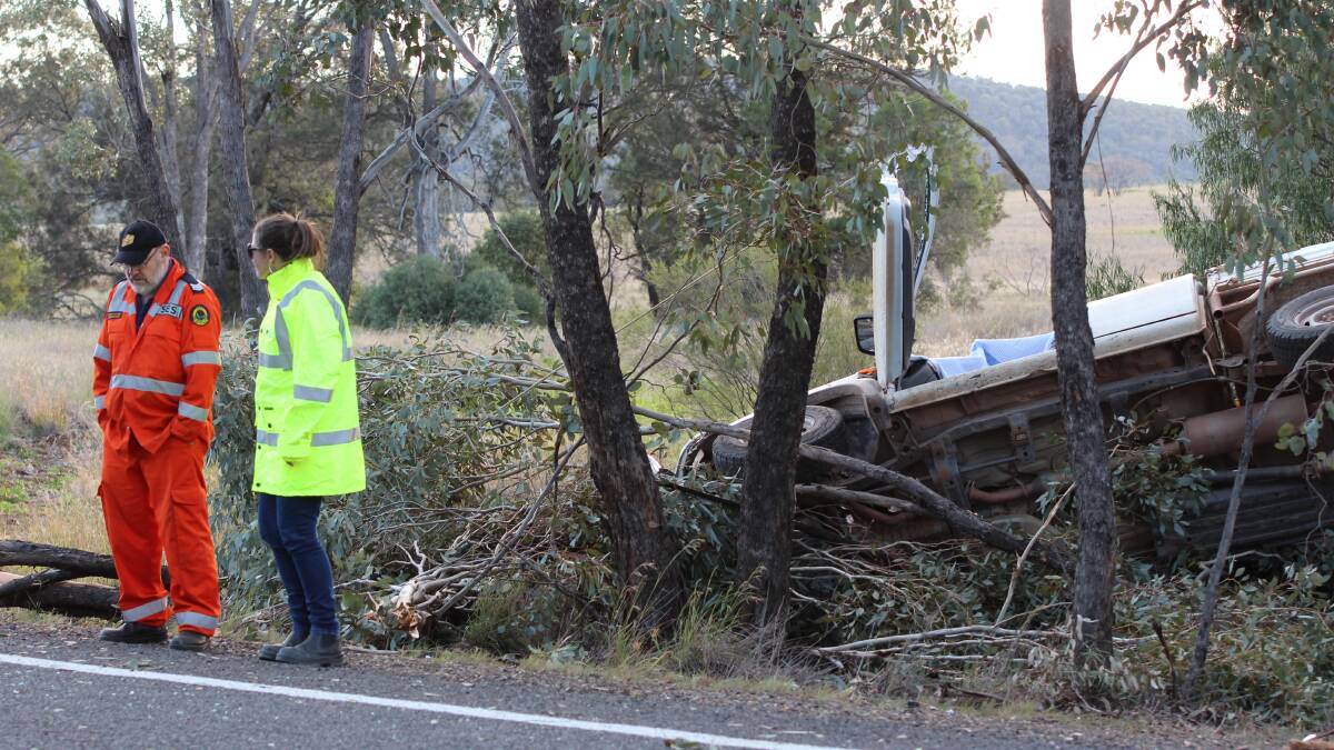 Emergency service workers at the scene of a fatal car accident near Gunnedah.