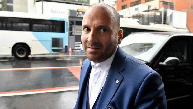 George Calombaris arrives at Downing Centre Local Court in Sydney on Friday. Photo: AAP
