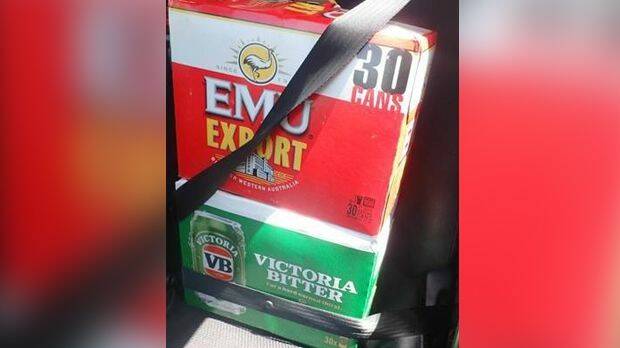 Cartons of beer were buckled into position while unrestrained children were in the car. Photo: Broome Police