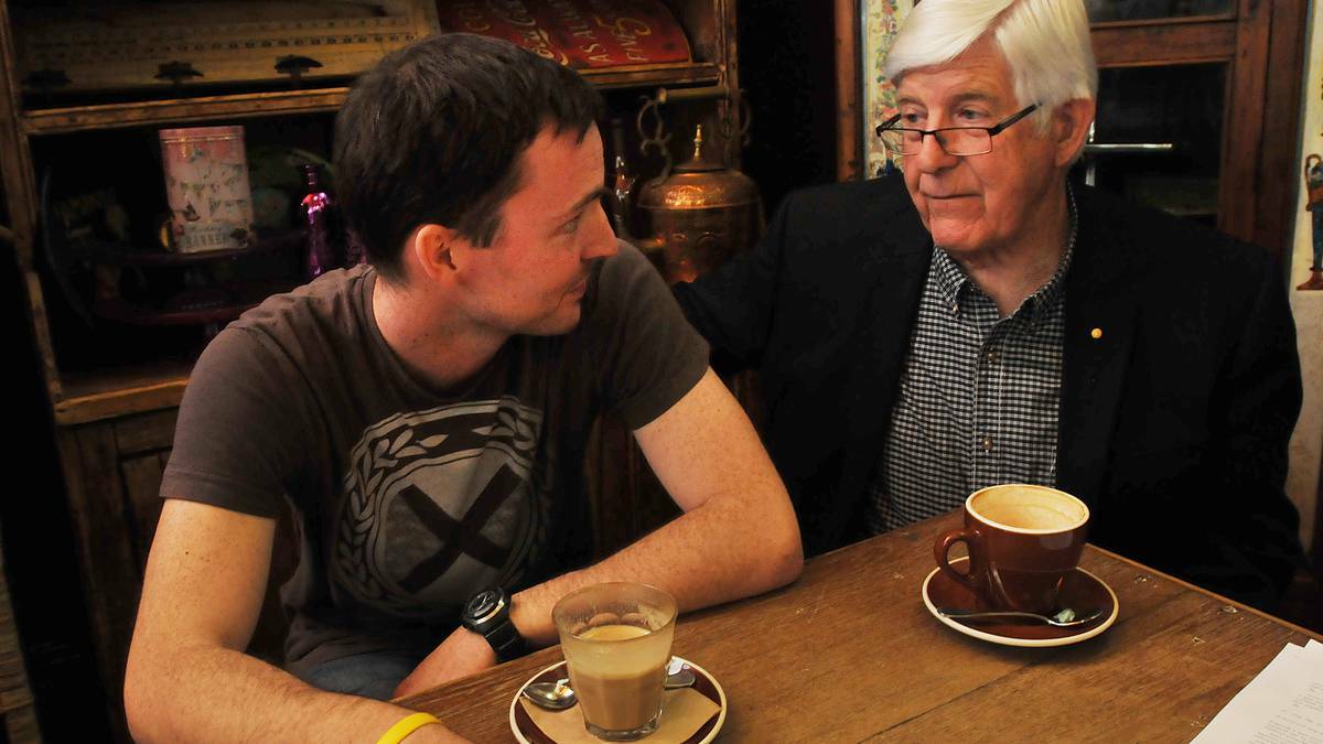 Tamworth councillor and anti-drug crusader Warren Woodley, right, discusses the merits of medical marijuana with local man Dan Haslam, who has terminal bowel cancer, in May 2014. Photo: Geoff O’Neill