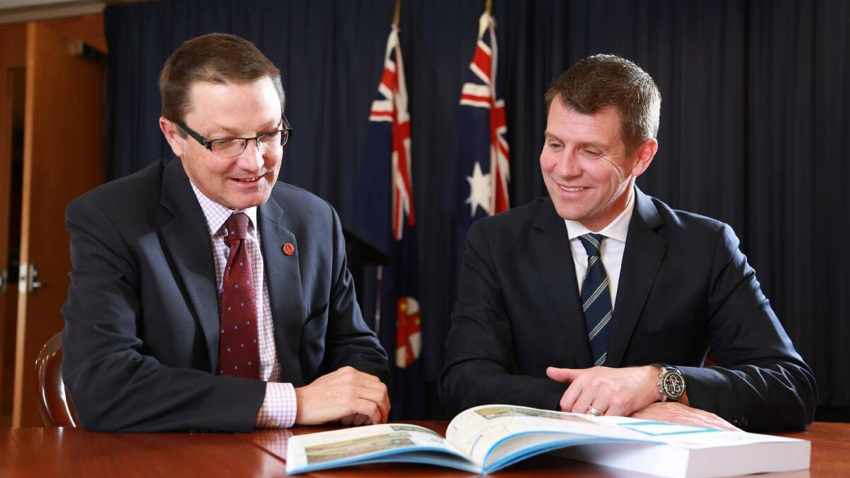 Guyra-based MLC Scot MacDonald with Premier Mike Baird pictured in 2015.
