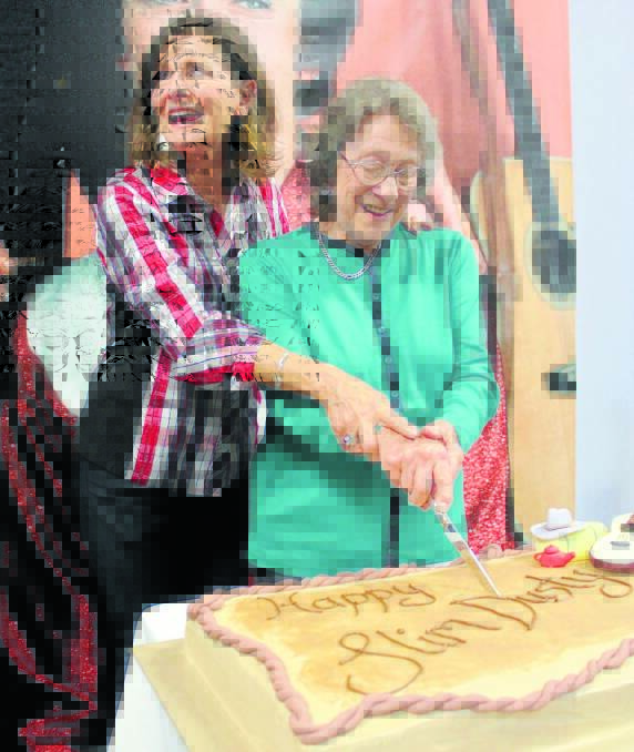 Anne Kirkpatrick and Joy McKean cut the cake on Slim’s birthday. Photos: Julia Morrell