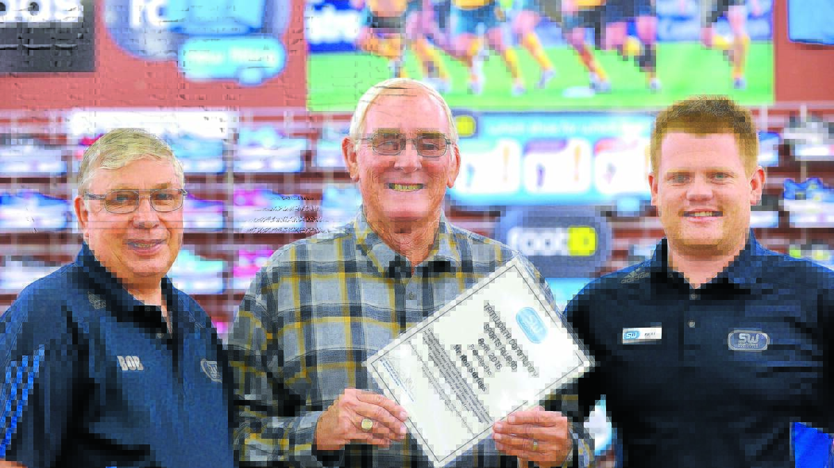 Sportsmans Warehouse managers Bob Barber and Ricky Craig flank local sporting identity Ron Surtees who was recognised with the Tamworth Community Sports Award this month.  Photo: Barry Smith 190516BSA01