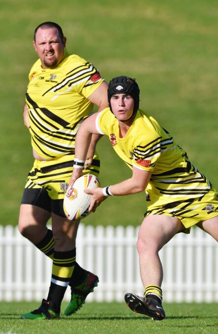 Oxley captain-coach Tim Coombes (left) will be hoping that hooker Micah Scarth (with ball) can keep a cool head this weekend as the Diggers head to Armidale searching for their first win in a huge weekend of blockbusters around the region. Photo: Barry Smith 220516BSC25