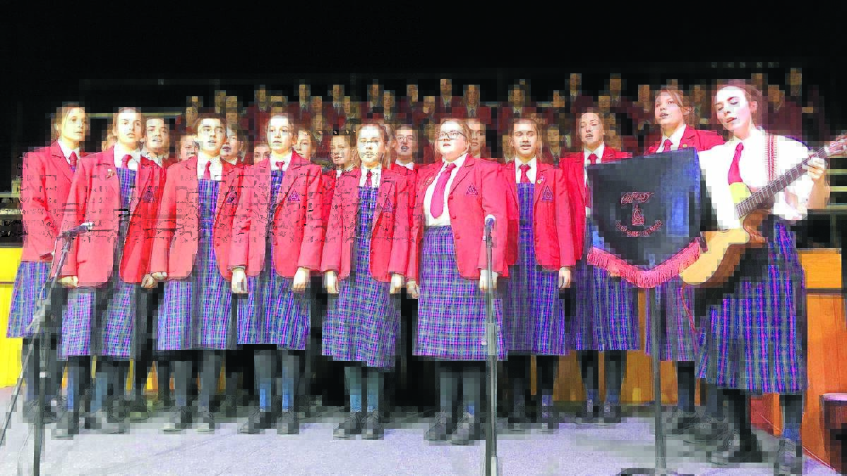 An 80-year tradition continues at Calrossy as Eliza Draper, with guitar, helps lead Karrawarra House to a win the annual house music competition.