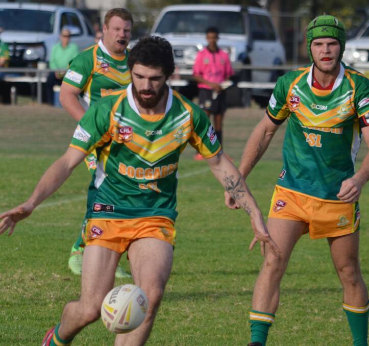 Boggabri’s Boyde Campbell puts a kick behind the line with his brother Jayde Campbell looking on. The Roos will be keen to turn the tables on Kootingal tomorrow after the Roosters ended their season last year. Photo: Chris Bath 210516CBA21