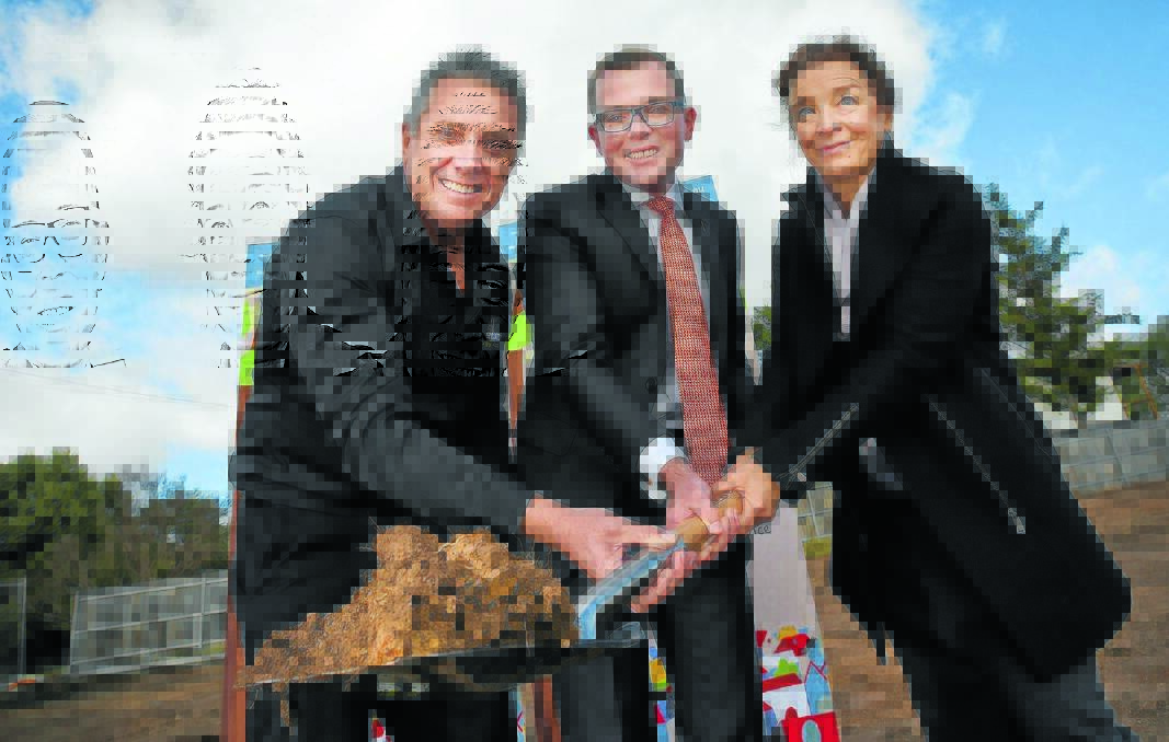 GROUNDBREAKING: Turning the first sod on the $2.1 million housing project on Wednesday were, from left, Richard Stubbs from Hibbards, MP Adam Marshall and Maree McKenzie from Homes North. Photo: Gareth Gardner 080616GGA03