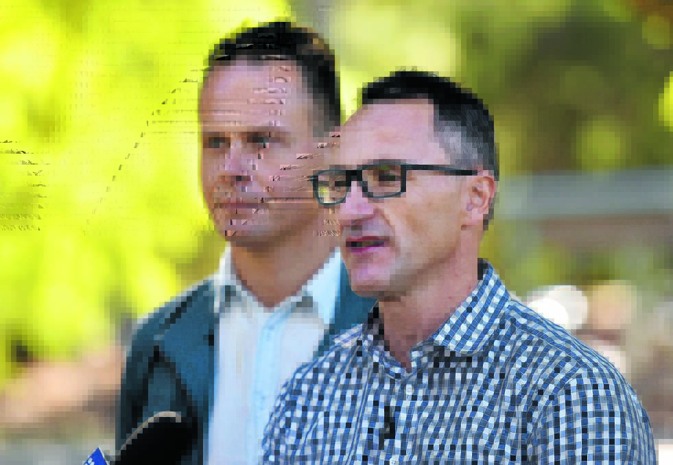 COMMITMENT NEEDED: Greens leader Richard Di Natale and Greens New England candidate Mercurius Goldstein. Photo: Geoff O’Neill 240516GOC01