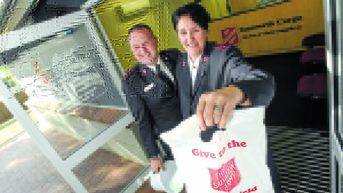 GIVE GENEROUSLY: Captains Dean and Rhonda Clutterbuck are preparing for the biggest weekend on the Salvation Army calendar. Photo: Gareth Gardner 250516GGD03