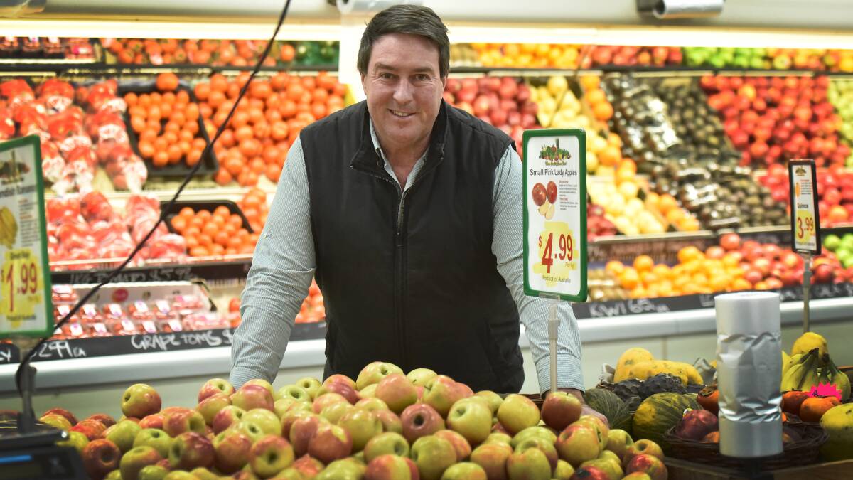 CERTIFIED FRESH: Farmer Bob’s Fruit Markets are finalists for three state awards, and owner Brendon North likes them apples. Photo: Geoff O’Neill 270616GOC01