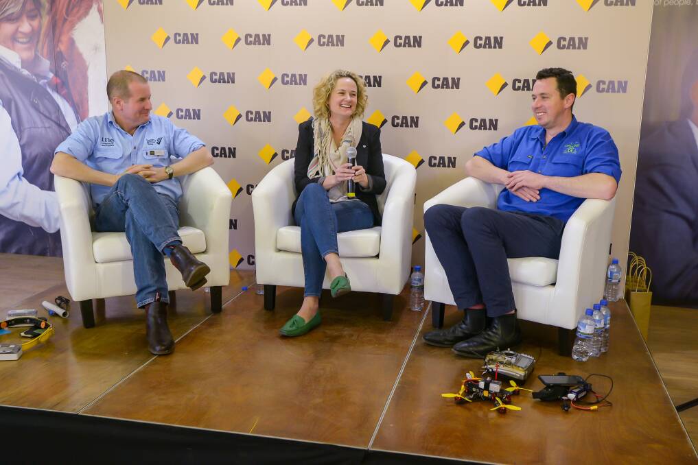 JUST DO IT: David Lamb, Anna Speer and Will Bignell at the AgTech panel on Thursday, with some of their 'props'. Photo: Peter Hardin 180816PHB04