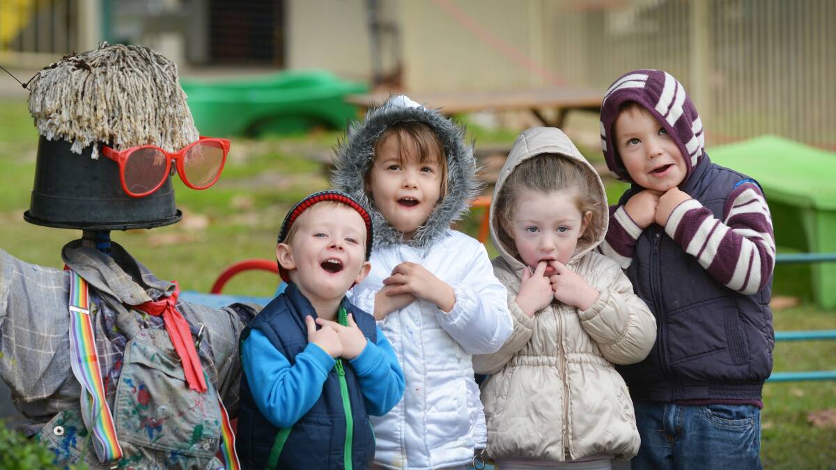 COOL KIDS: St Mark’s pre-schoolers were all rugged up for the day as the minimum temperature stayed in single figures. Among the chattering classes were, from left, Jacob Smith, aged three, and four-year-olds Alannah Hathway, Annabelle Dean and Xavier Parris. Photo: Barry Smith 270616BSB06