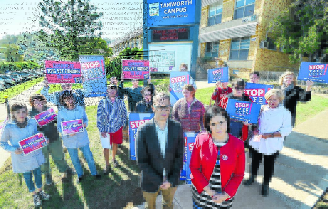 STOP THE CUTS: Daniel Moohkey and Prue Car showing their support for TAFE teachers and students in Tamworth. Photo: Barry Smith 240516BSC06