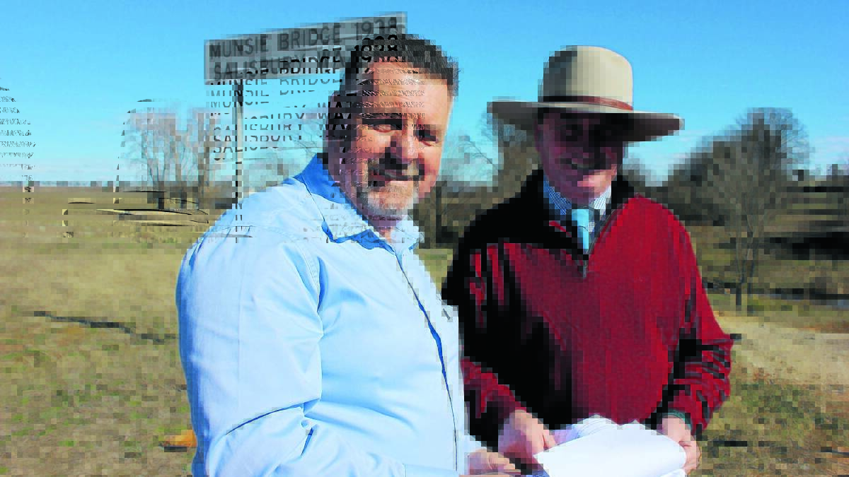 WOOD TO STEEL: Uralla shire mayor Michael Pearce and Barnaby Joyce at the Munsie Bridge.