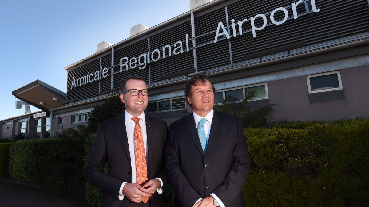 UP, UP AND AWAY: Northern Tablelands MP Adam Marshall and Armidale Regional Council interim general manager Glenn Wilcox after yesterday’s announcement.  Photo: Gareth Gardner 080616GGB06