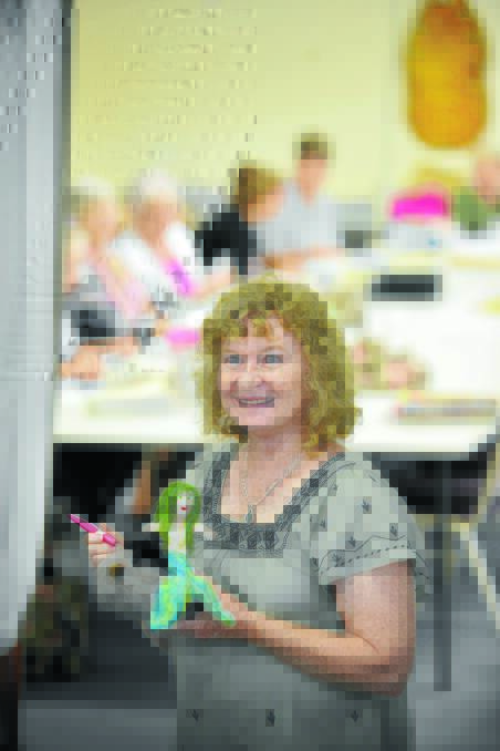 CREATIVITY: Tamworth Art and Craft president Pam Wright, with a mermaid she’s making through needle felting. Photo: Barry Smith 310316BSD01