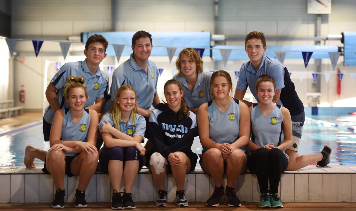 Part of the throng of Tamworth water polo players off to major tournaments next week (back from left) Lachlan Wheeler, Kane Clinch, Jake Mitchell, James Newberry (front from left) Mikayala Gross, Billie Mitchell, Lucy Hofman, Harriet Lyden and  Georgia Irwin. Photo: Gareth Gardner 290616GGA01