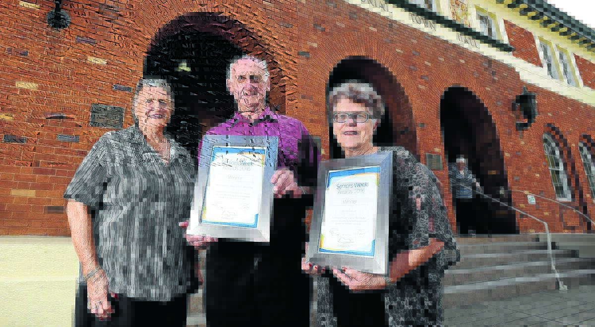 GIVING THEIR ALL: Tamworth Senior of the Year Denise Sullivan, right, with Joan Davis and Bruce Adams, who accepted the award for community group of the year, the Tamworth Seniors’ Week Organising Committee. Mrs Davis and Mr Adams were treasurer and president respectively. Photos: Gareth Gardner 040416GGC18