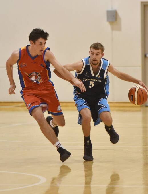 Matt Monkton (right)  drives up the court for the Tamworth Thunderbolts earlier in the season against the Central Coast  Crusaders. The Thunderbolts have a double header this weekend, playing Port tonight and Coffs Harbour tomorrow. Photo: Geoff O’Neill 230416GOG07