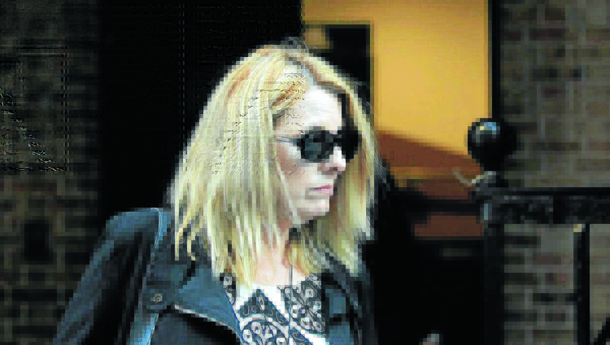 TRIAL BEGINS: Alison McKenzie leaves King St Courts in Sydney after hearing evidence in the the case of Ian Robert Turnbull, accused of murdering her partner, environmental officer Glen Turner: Photo: James Alcock