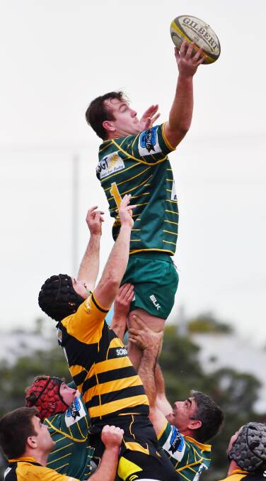 Inverell’s Tom Apthorpe soars above Pirates’ Conrad Starr to win this lineout on Saturday. Photo: Barry Smith 160716BSG11