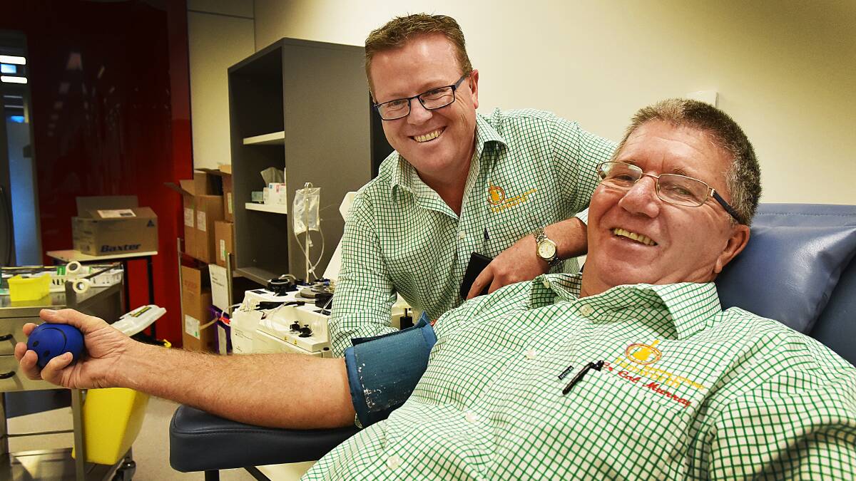 BLEEDING FROM THE FRONT: TRC general manager Paul Bennett and mayor Col Murray encourage other organisations to take their bleed and donate blood in the challenge. Photo: Geoff O’Neill 140416GOC01