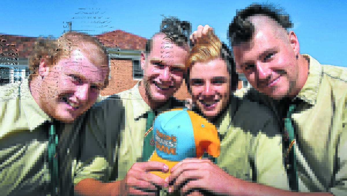 LOST LOCKS: From left, Farrer Year 12 students Tom McGowan, Connor Size, Lachlan Fauchon and Aaron O’Shea lose their locks for charity. Photos: Geoff O’Neill 030516GOB01