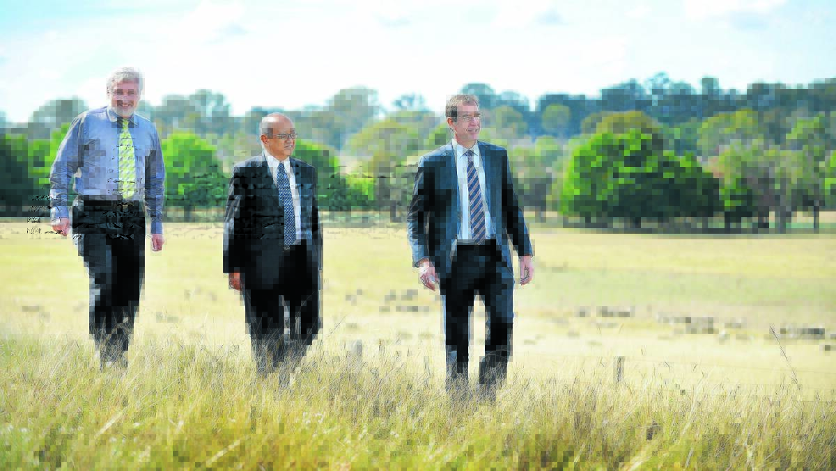STRONG BOND: Pictured at the UNE SMART Farm yesterday were, from left, UNE pro vice-chancellor of research Heiko Daniel, Indonesian ambassador Nadjib Riphat Kesoema and Dr Nick Austin, chief executive officer of the Australian Centre for International Agricultural Research. 190416BSA09
