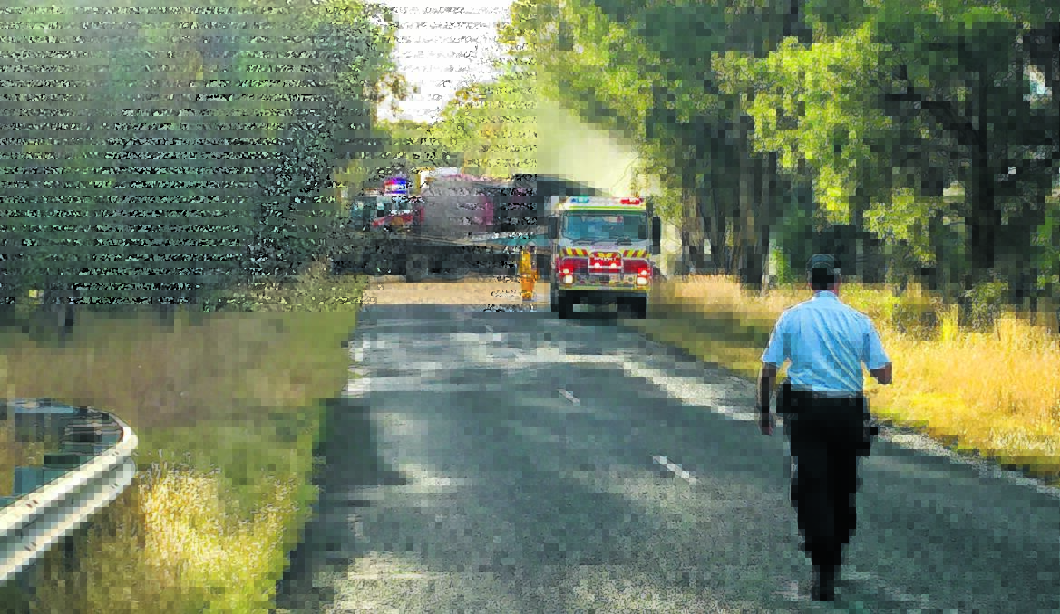 FIERY CRASH: Two people, believed to be truck drivers, have been killed after an horrific head-on accident on the Thunderbolts Way near Uralla yesterday afternoon. See the story on page 2. Photo: Matt Bedford