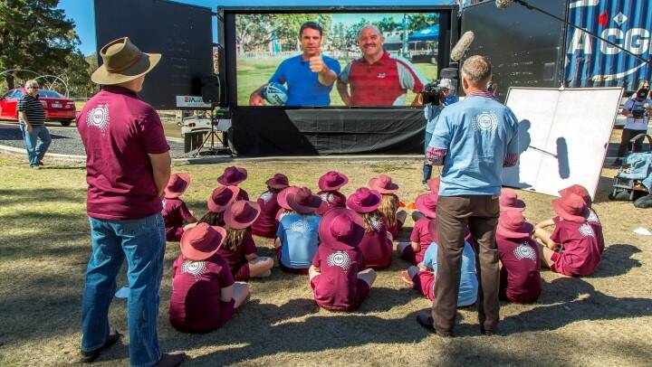 LESSONS FROM LEAGUE LEGENDS: Brad Fittler and Wally Lewis talk to the students during the skype session.