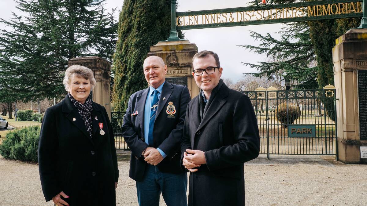 Renovated: Northern Tablelands MP Adam Marshall, far right, and Glen Innes RSL secretary Gail Turnbull and President Gordon Taylor standing in front of the Glen Innes ANZAC Park National Service Memorial and Garden gates that will be renovated.