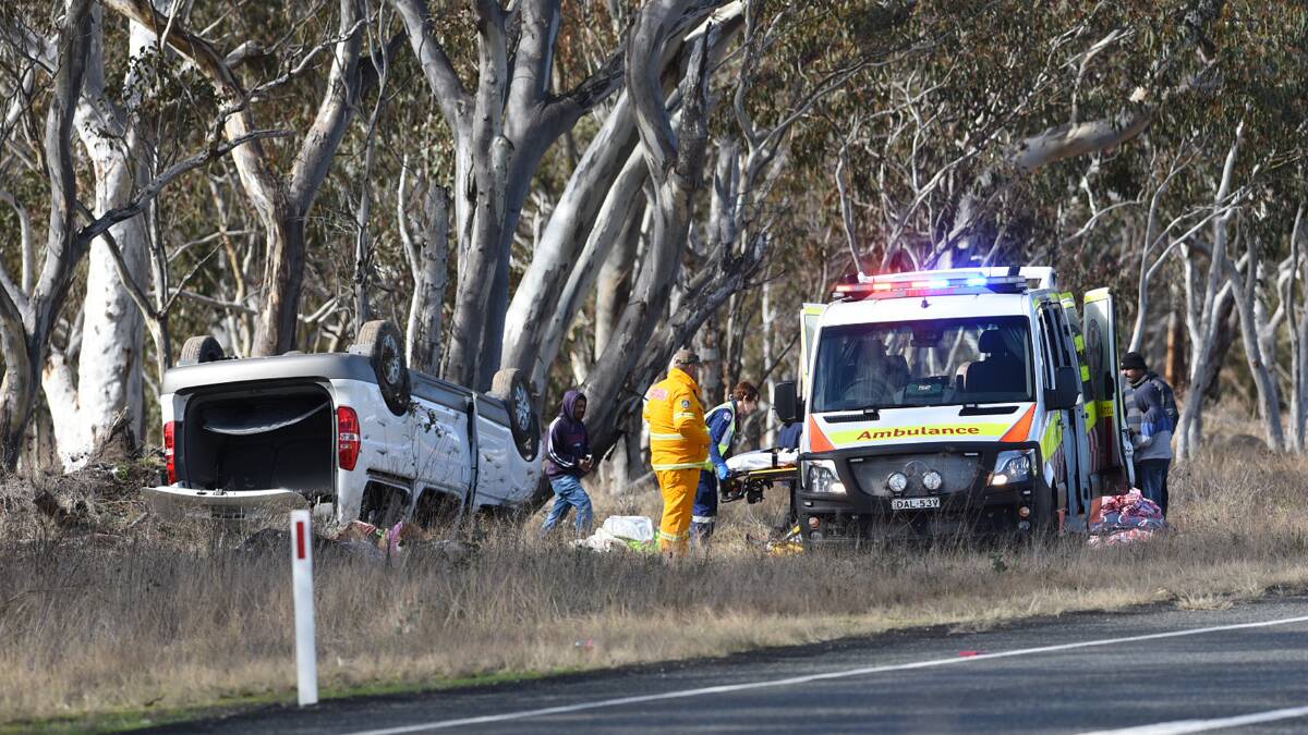 Emergency services respond to the highway crash that happened about 11am. Photo: Gareth Gardner