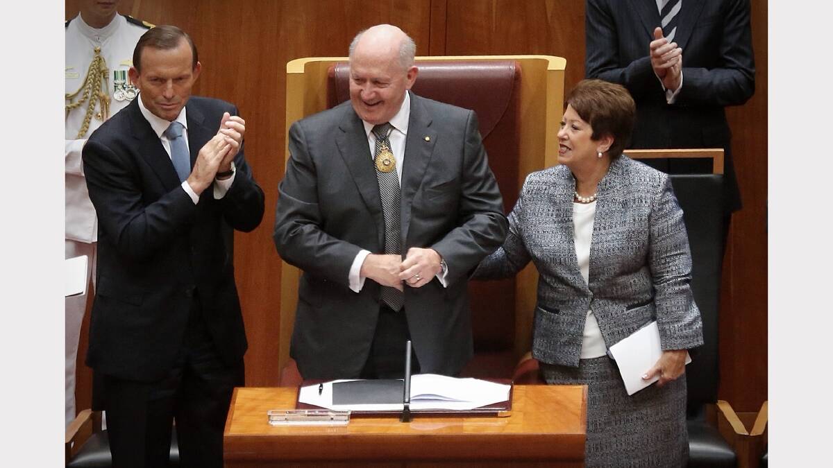 The swearing-in of General Sir Peter Cosgrove as the Governor-General of Australia with his wife Lynne and Prime Minister Tony Abbott at Parliament House on Friday. Photo: Andrew Meares