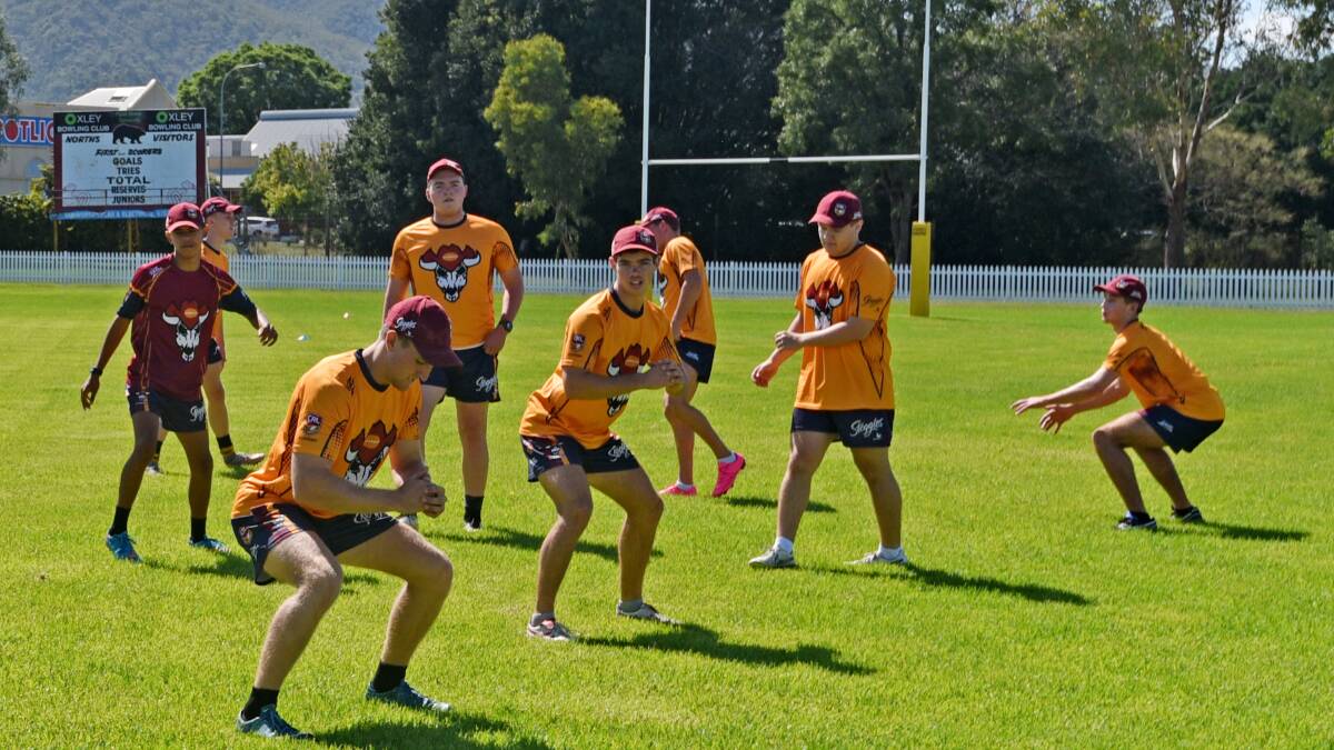 GNA squad members limbering up for Saturday s session (back from left) Steven McGrady (maroon shirt), Morgan Amidy (behind ), Ian Carter, Zac Butler (front from left) Brock Matthews, Will McAuliffe, Jacob Haynes, James Bradley.  
Photo: Geoff O Neill 060216GOB01
