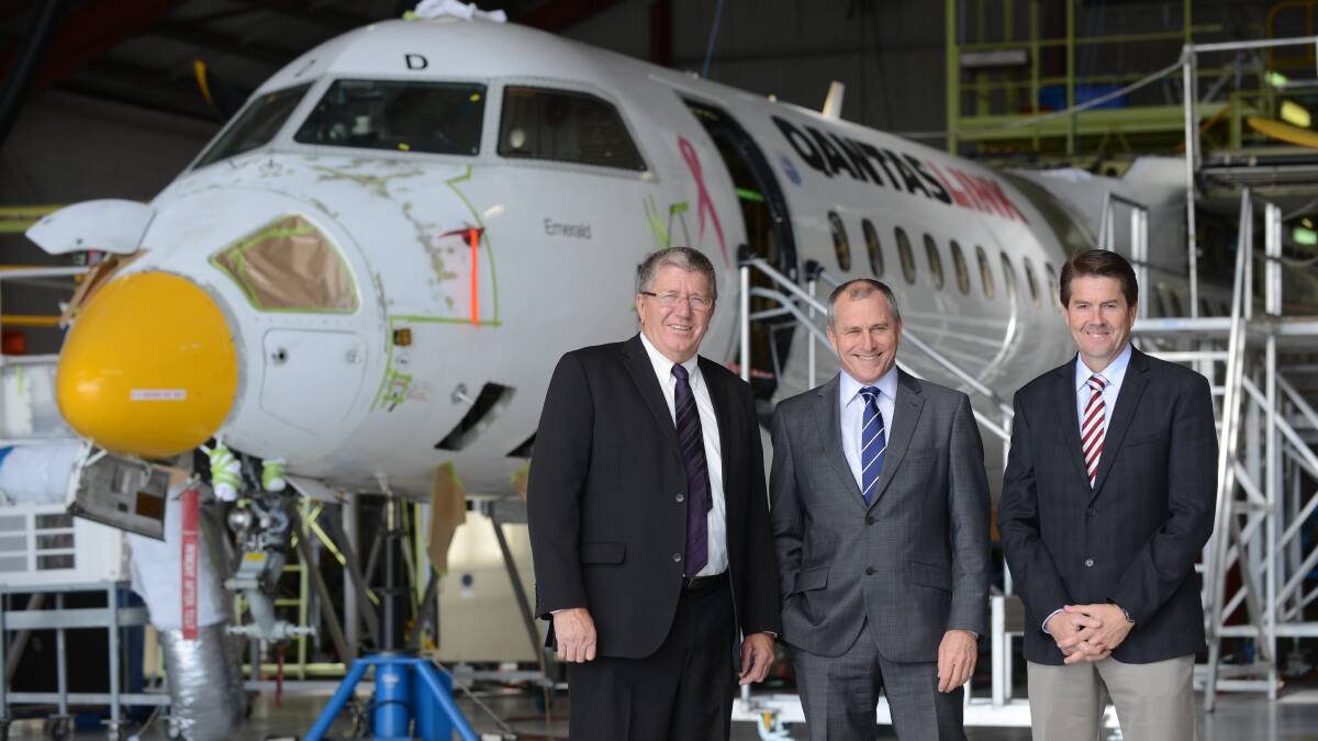 BIG NEWS: Tamworth mayor Col Murray, QantasLink chief executive officer John Gissing and Tamworth MP Kevin Anderson are all smiles after announcing the expansion of the city's heavy maintenance facility.