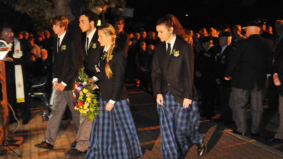LEST WE FORGET: Thousands gathered at Tamworth's Anzac Park this morning for the Anzac Day Dawn Service.  Photos:Geoff O'Neill.  
