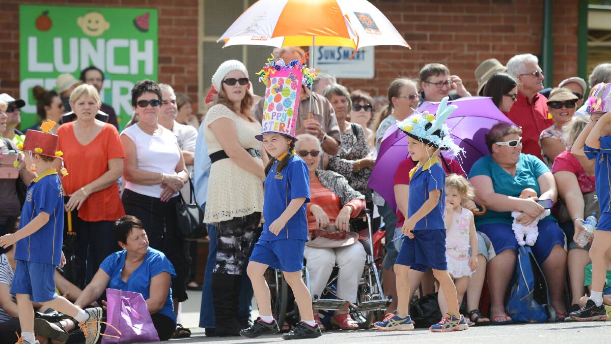 Parents line up to watch the students parade. Photo:Barry Smith 110414BSE34
