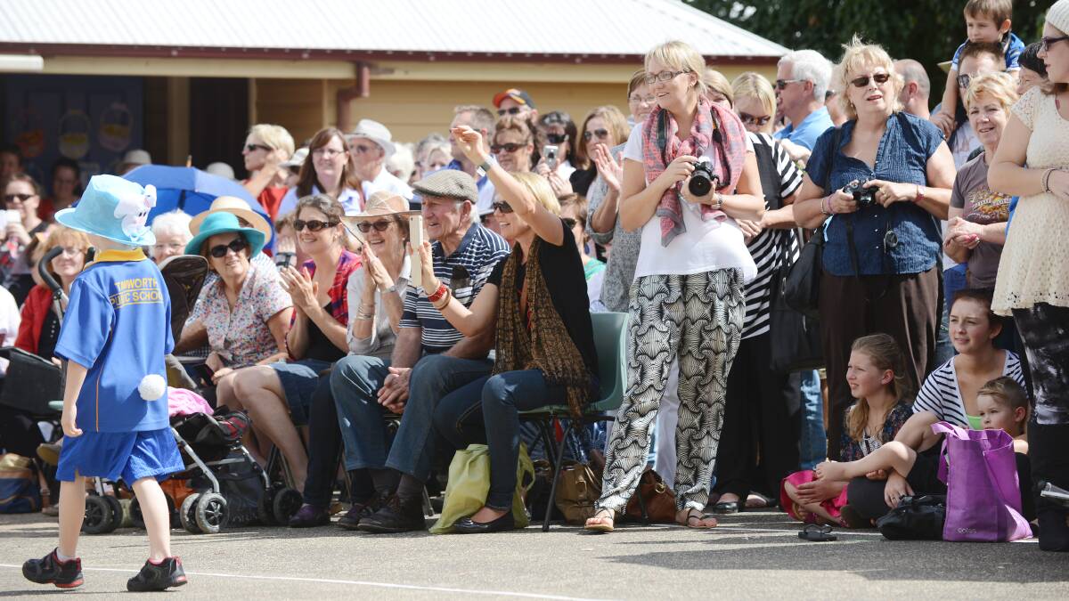Parents line up to watch the students parade. Photo:Barry Smith 110414BSE13