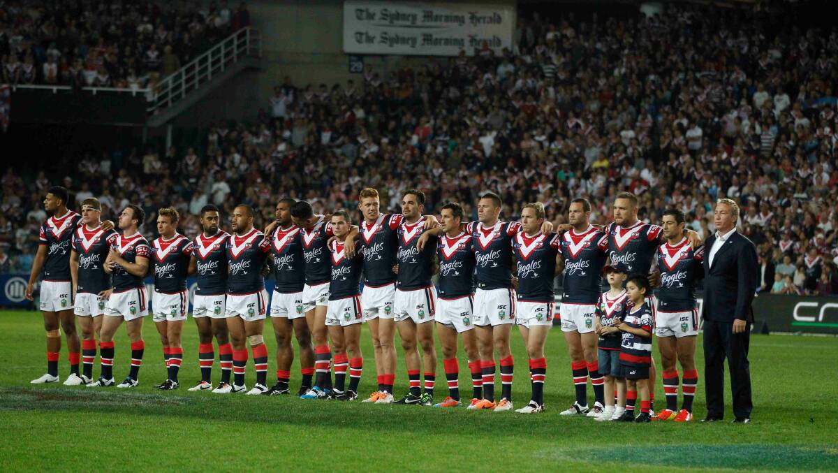 The Sydney Roosters sing the national anthem prior to the World Club Challenge game against Wigan Warriors at Allianz Stadium. Picture: Anthony Johnson