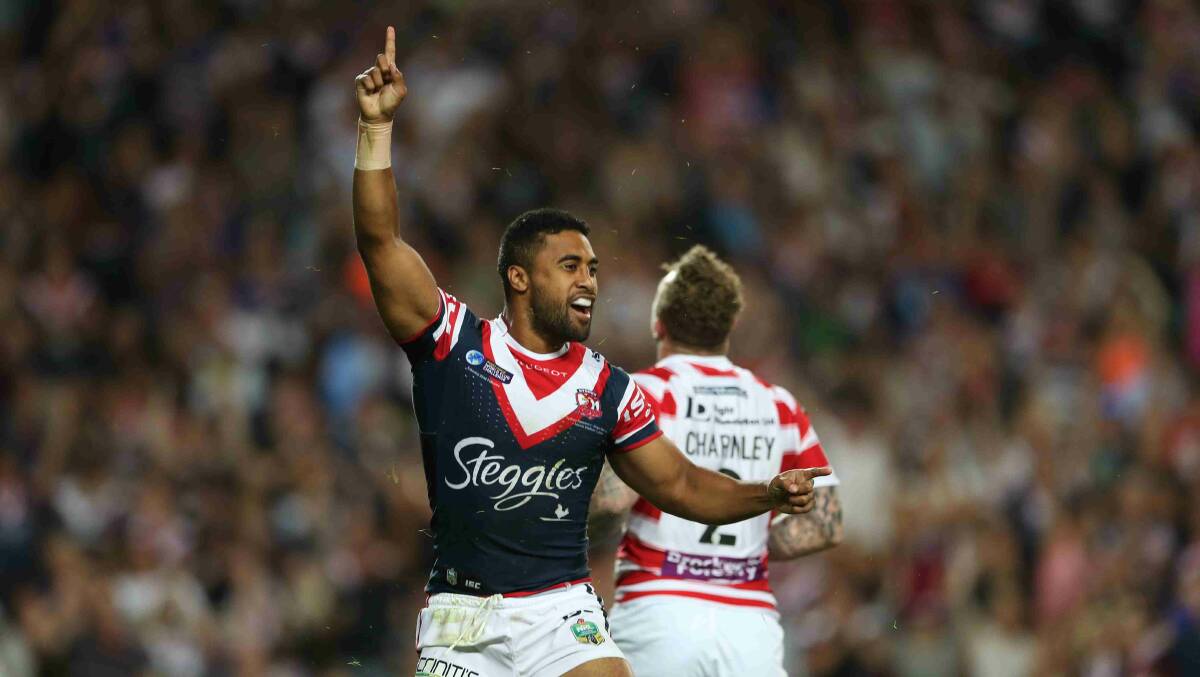 Michael Jennings celebrates after scoring for the Roosters in the World Club Challenge game against Wigan Warriors at Allianz Stadium. Picture: Anthony Johnson