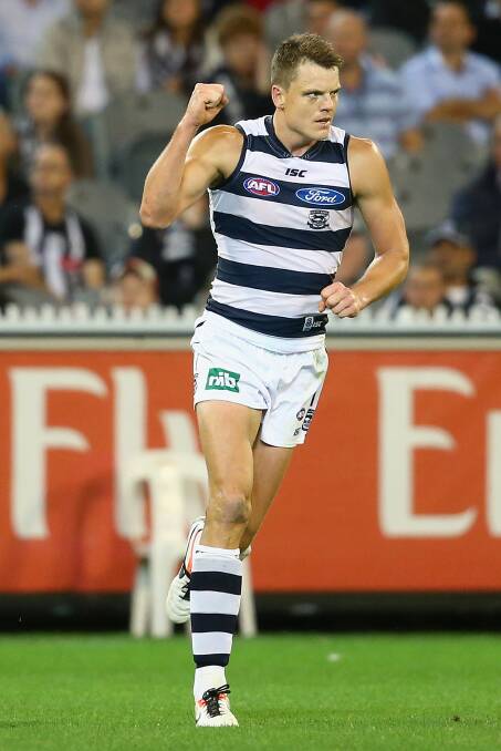 Hamish McIntosh of the Cats celebrates kicking a goal at the MCG. Geelong ran out 87 points to Collingwood's 76. Picture: Getty Images