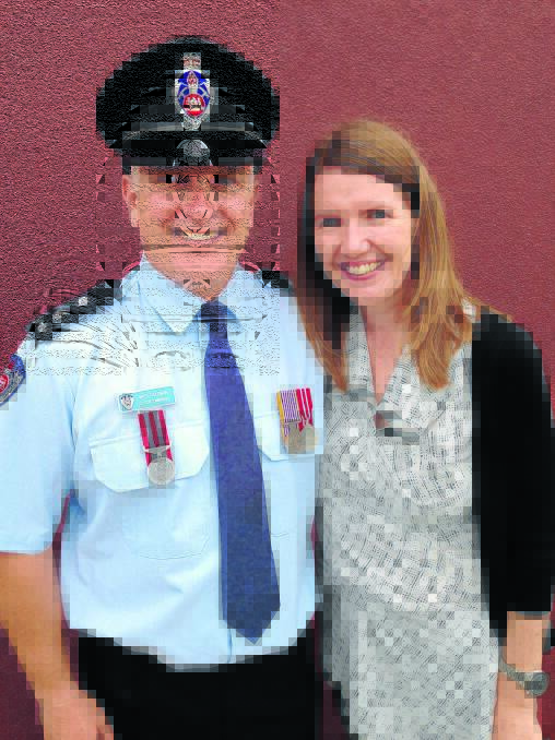 Glen Innes Station Commander Matt Goldman and his wife Gigha Goldman take in the celebrations at the weekend.