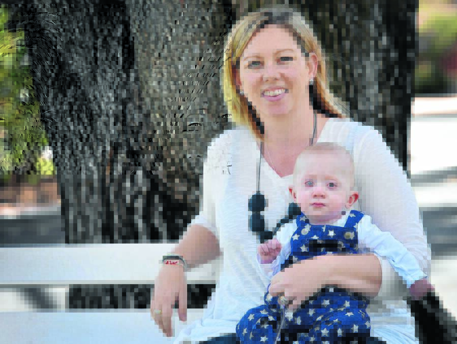 MOTHER LOVE: Bendemeer mum Christie Powell, with young Wyatt, will see a big local fundraiser to help with medical costs associated with little Wyatt’s Noonan’s syndrome health problems. Photo : Geoff O’Neill 090915GOC02